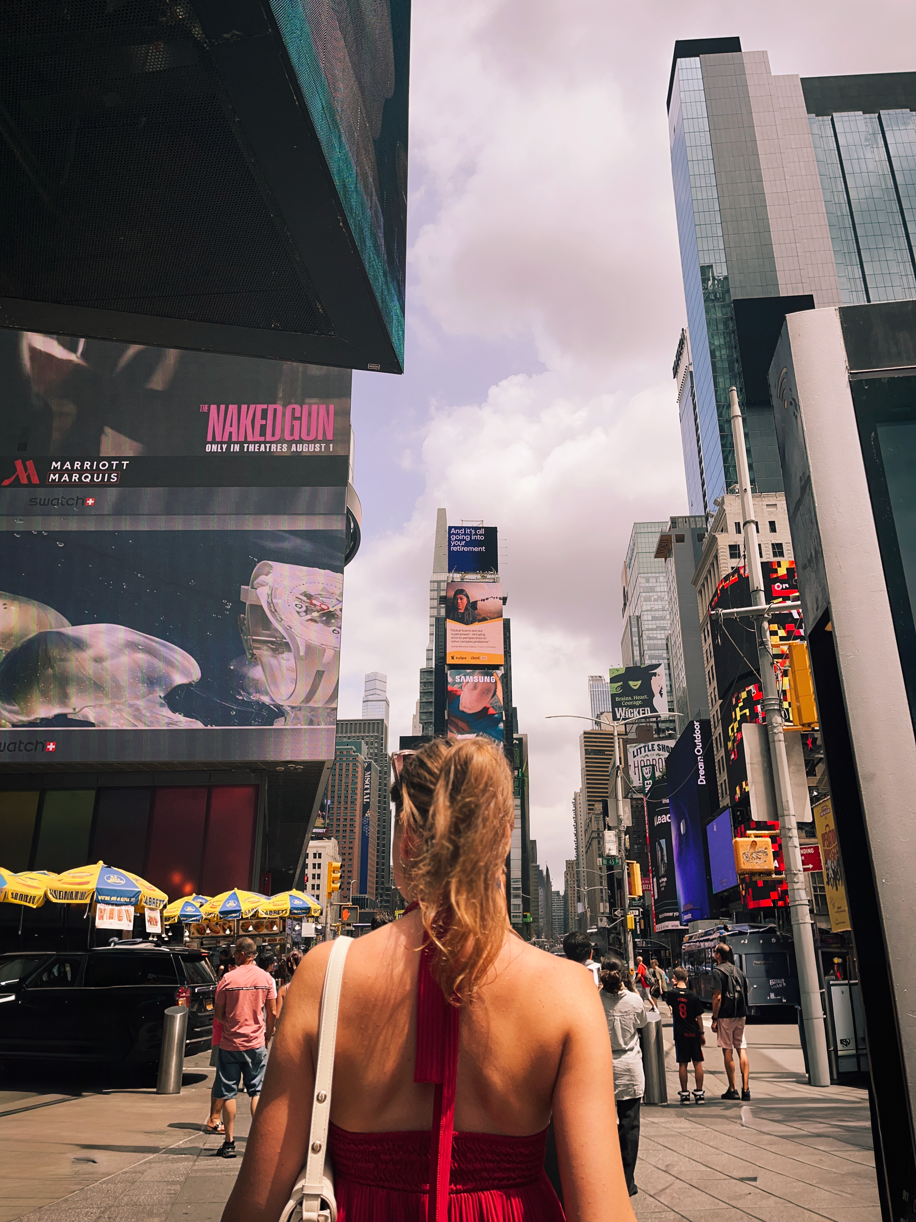 Back view of a woman in Times Square, New York